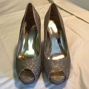 Nine West Qtpie peep toe pump.